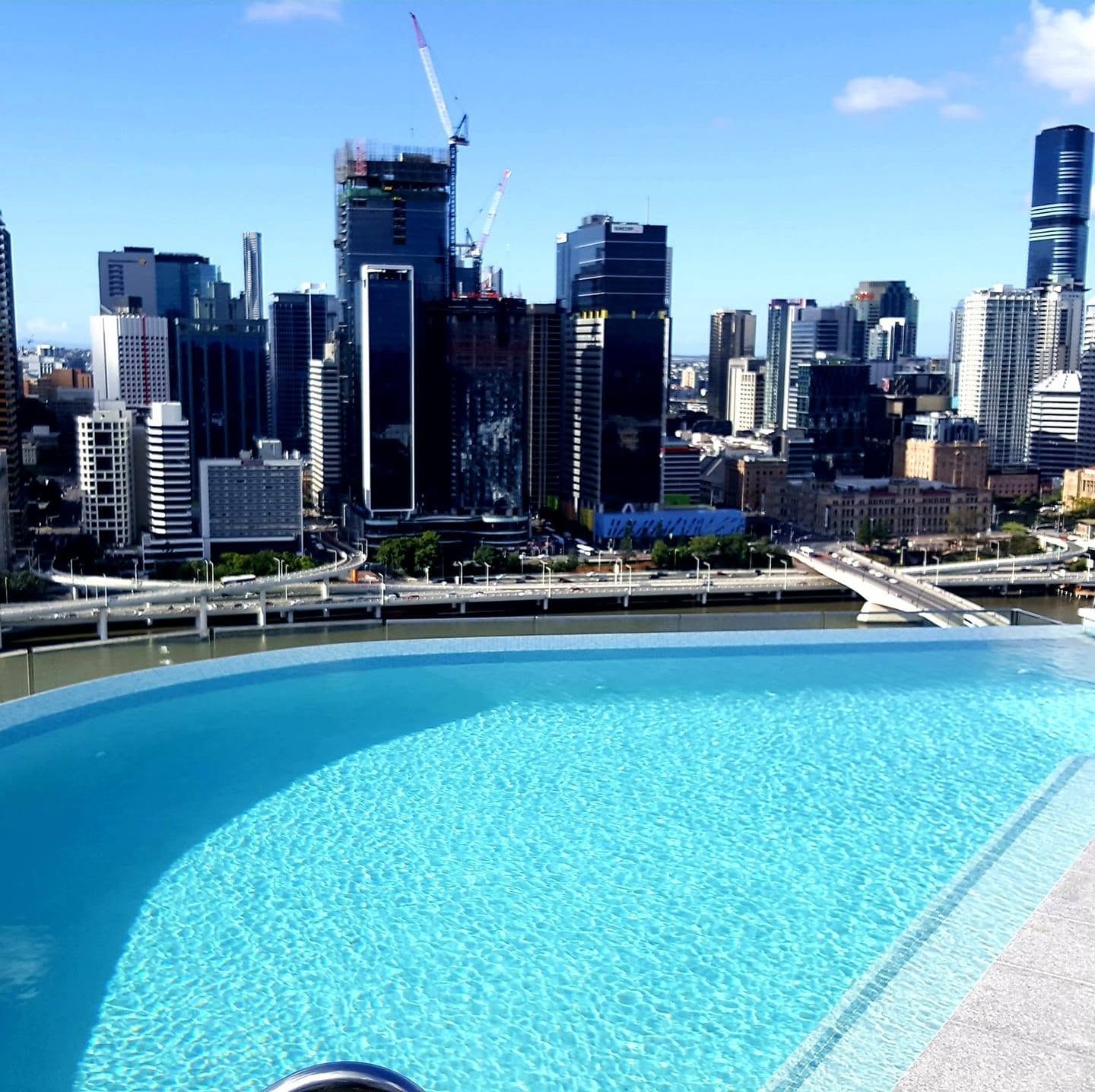 Sparkling infinity-edge pool maintained by Pool Fast Services & Repair